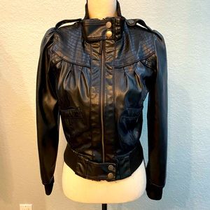 Black faux leather jacket.